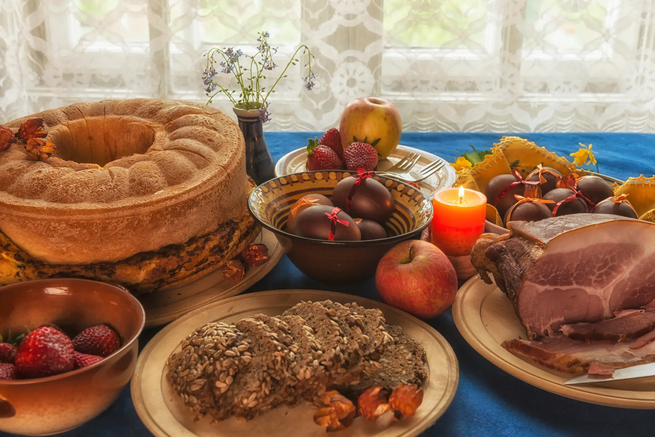 Festive Slovenian table with traditional potica served during important family celebrations