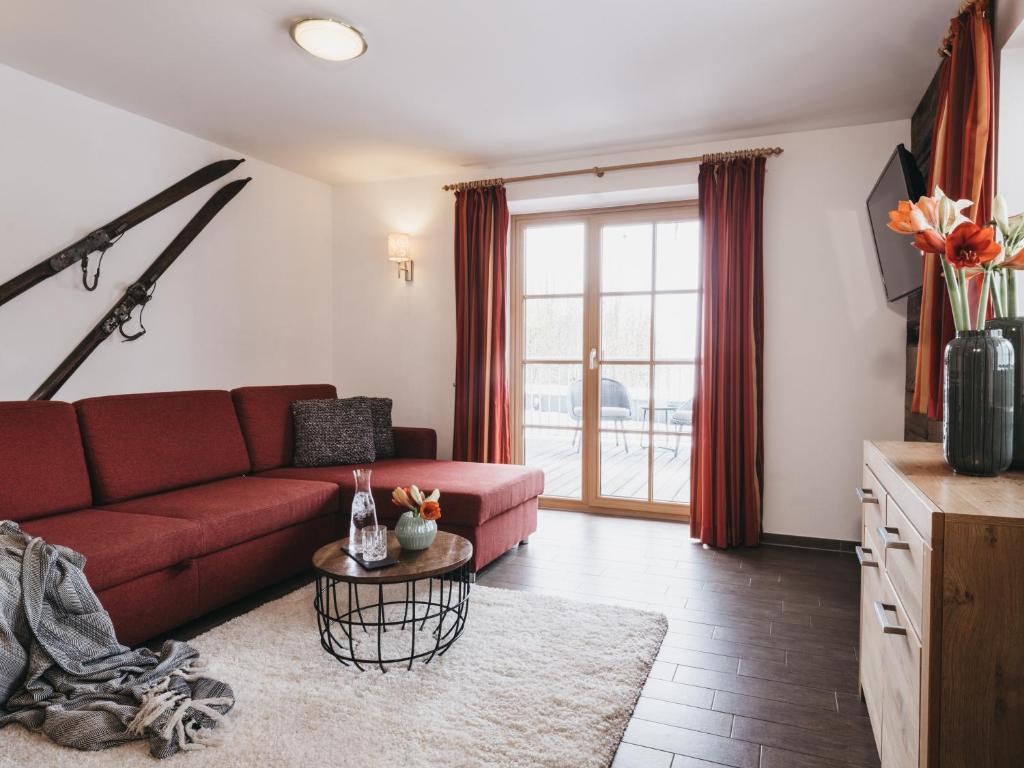 saalbach-residence-kristall-trisobni-dnevna-soba.jpg