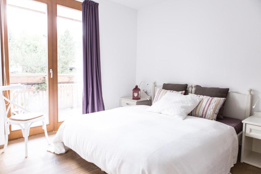 apartmaji-mariagrazia-spalnica.jpg