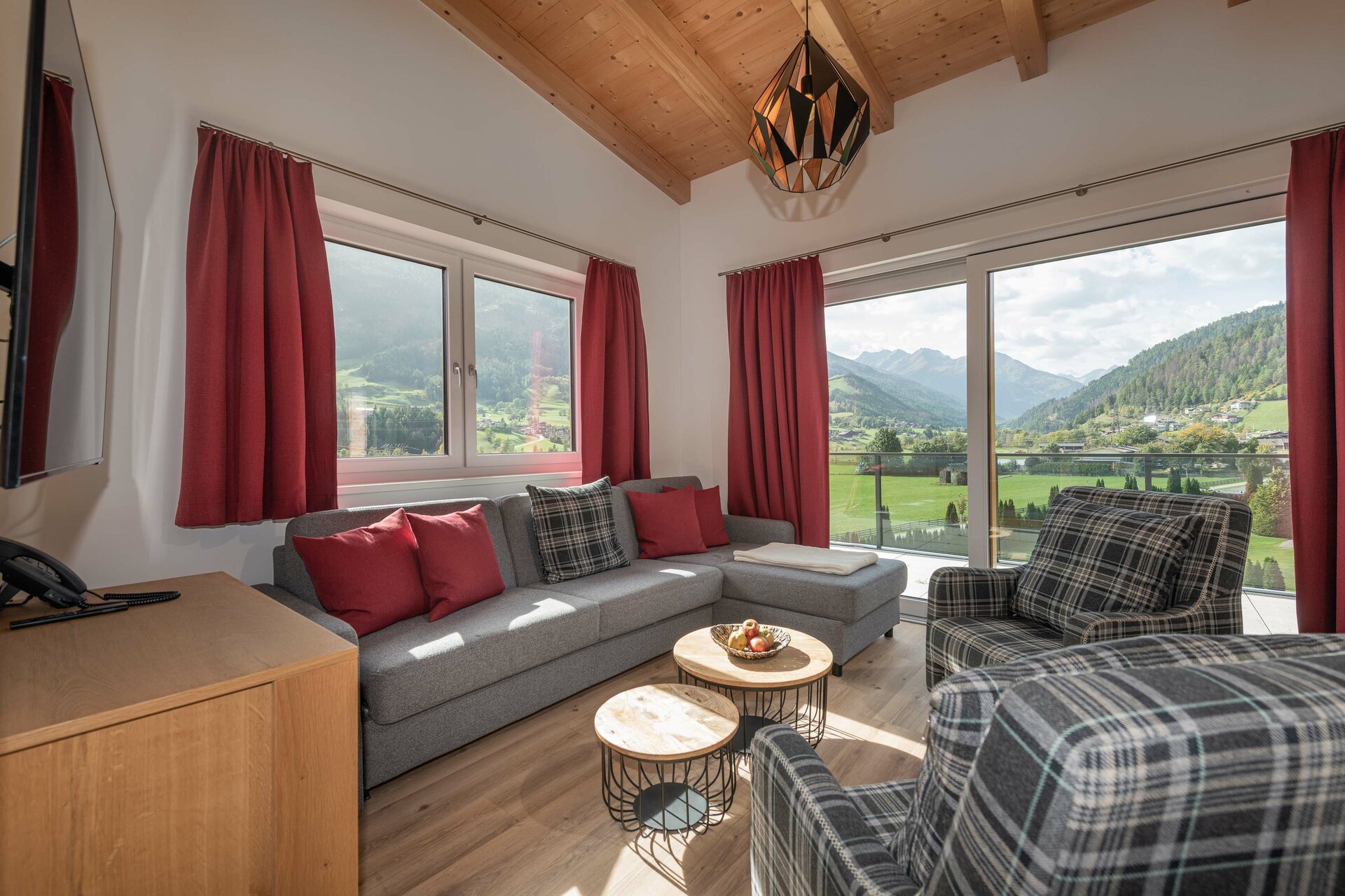 skiopening-matrei-aparmaji-montana-alpenparks-penthouse-dnevna-soba.jpg