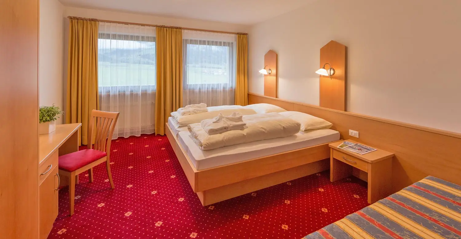 apartmajska-hisa-steiner-spalnica.webp